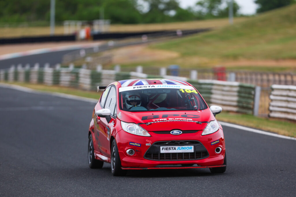 red ford fiesta junior of jack burgess at mallory park for the brscc fiesta junior championship